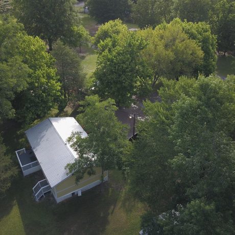 aerial view of park with grass and trees